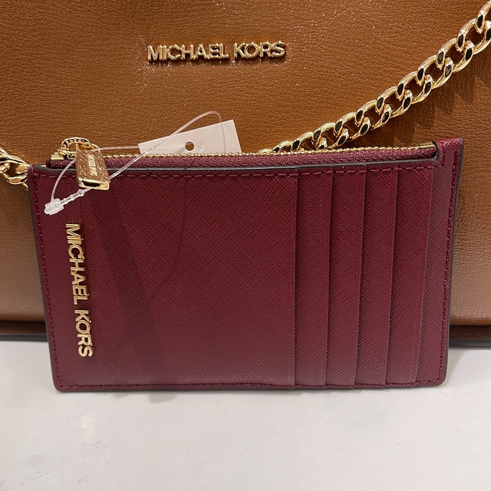 MICHAEL KORS
Jet Set Travel Medm Top Zip Leather Card Case Wallet
Dk Cherry
NWT - Picture 10 of 16